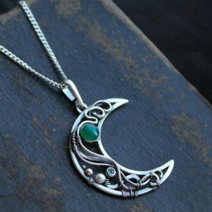 Stainless steel crescent moon with moonstone